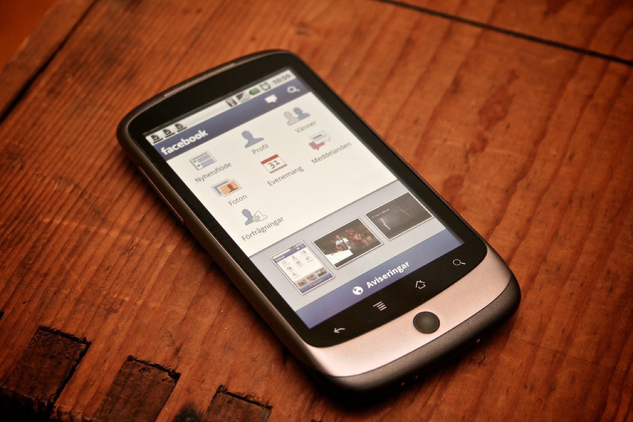 A phone showing a Facebook Reel with the view counter stuck at a low number